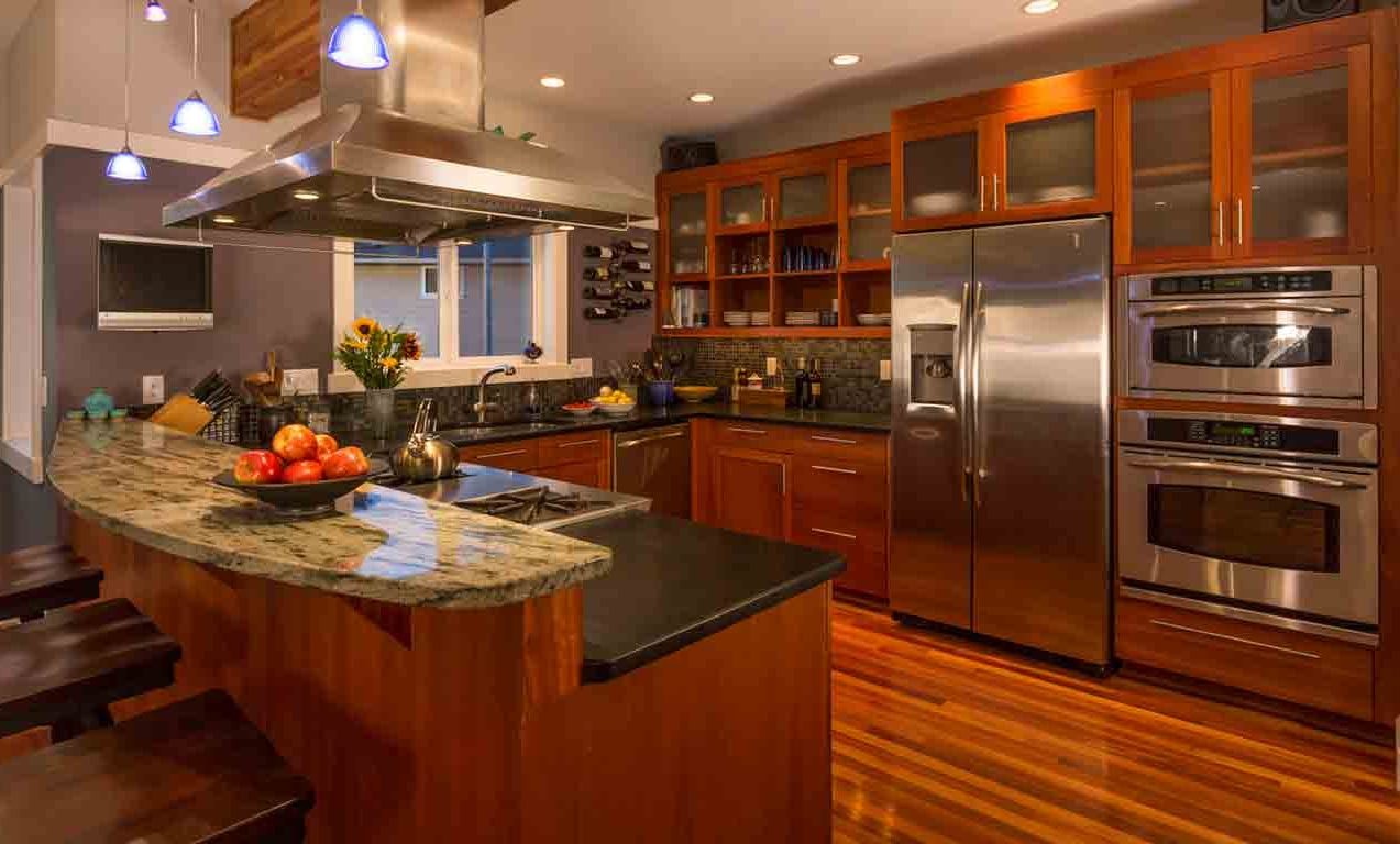 Warm kitchen with stainless appliances